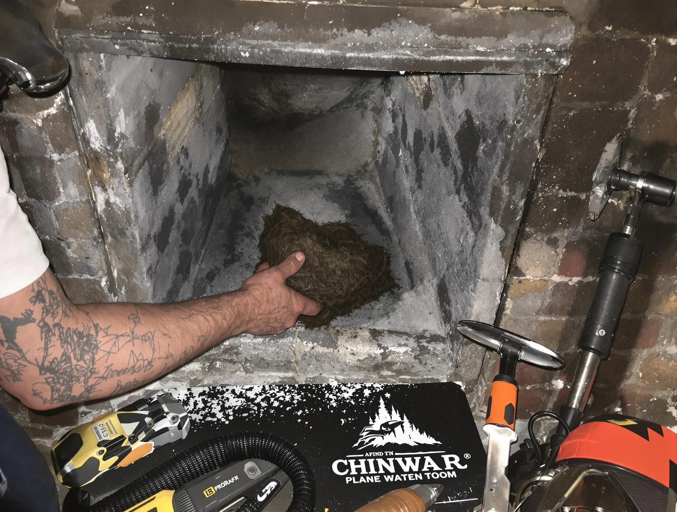 North Salt Lake Chimney Sweep safely removing debris and screening chimney in North Salt Lake, UT