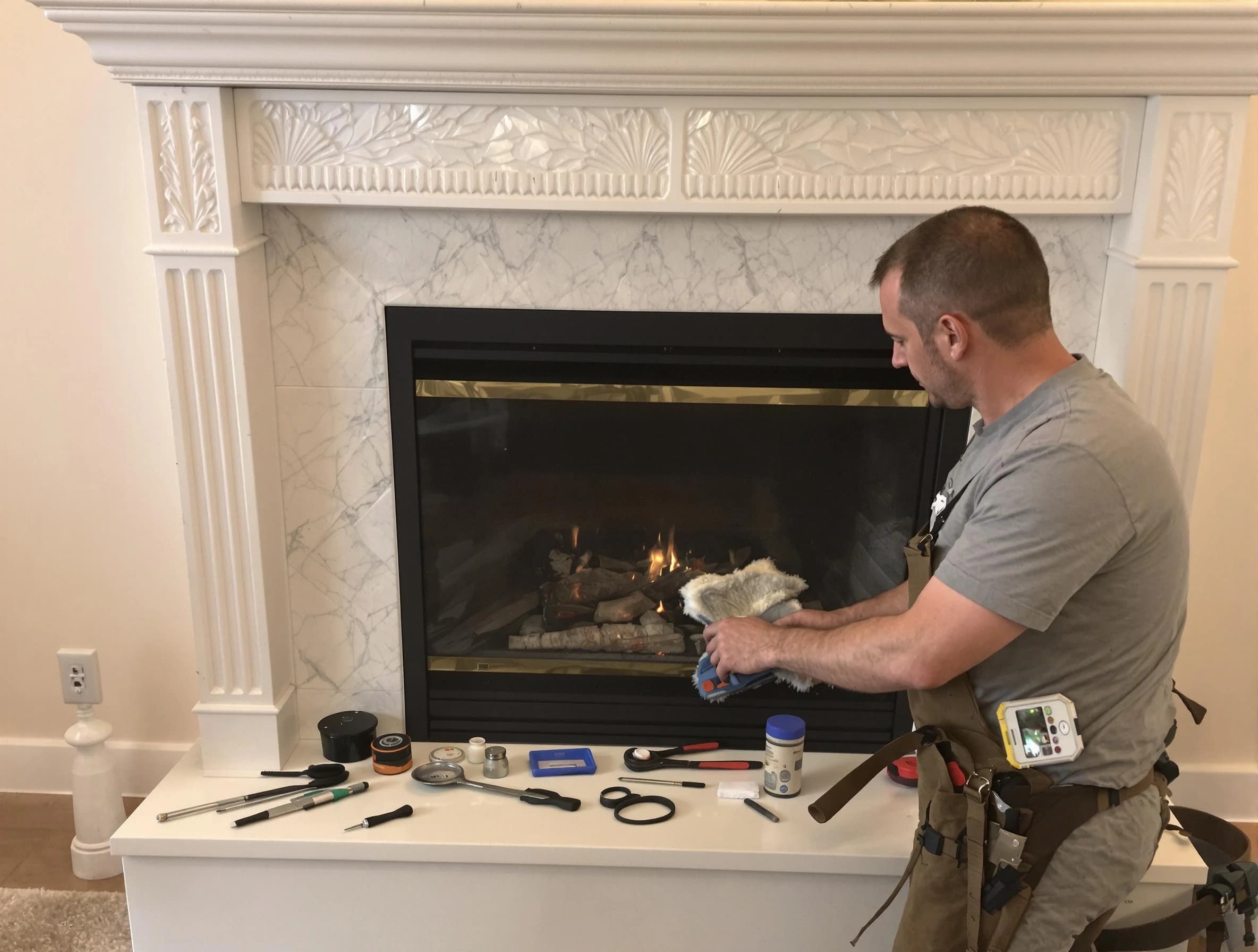 North Salt Lake Chimney Sweep performing fireplace maintenance in North Salt Lake, UT